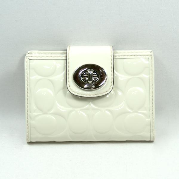 coach turnlock clutch white