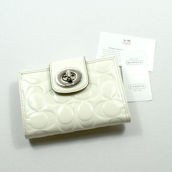 coach turnlock clutch white