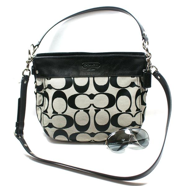 white and black coach purse