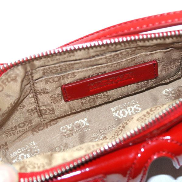 mk red wristlet