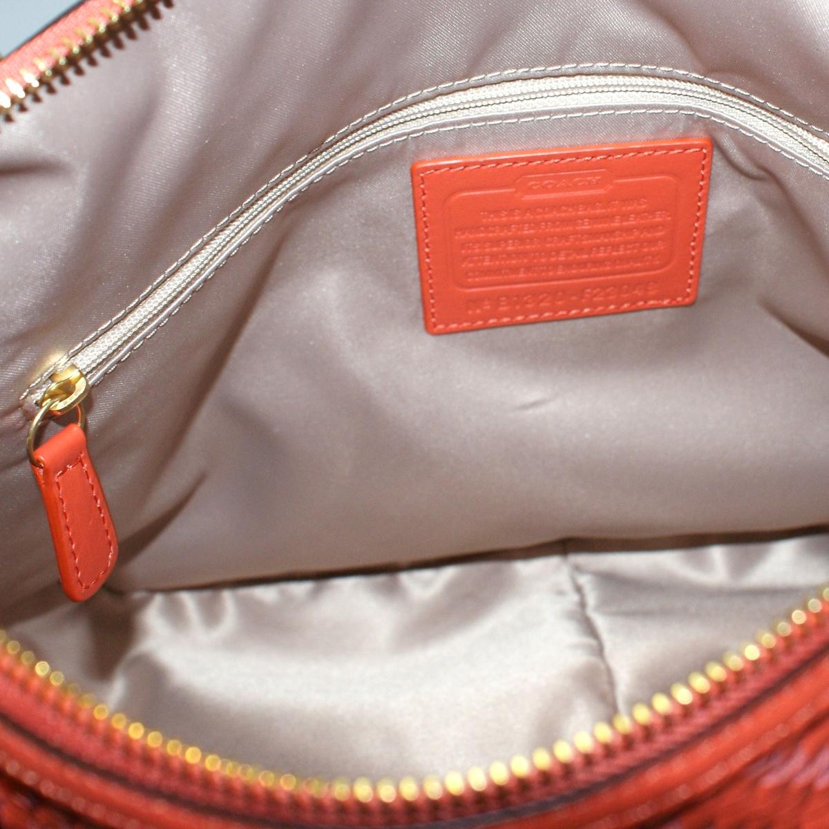 burnt orange coach purse