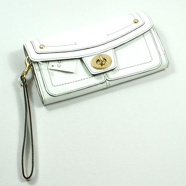 white wristlet clutch bag